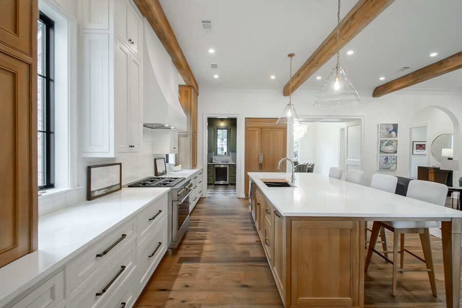 Kitchen prep pantry with floor-to-ceiling custom cabinetry