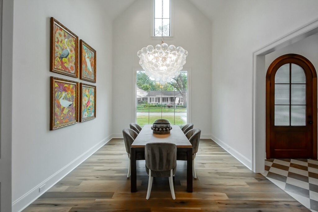 Formal dining area with designer chandelier