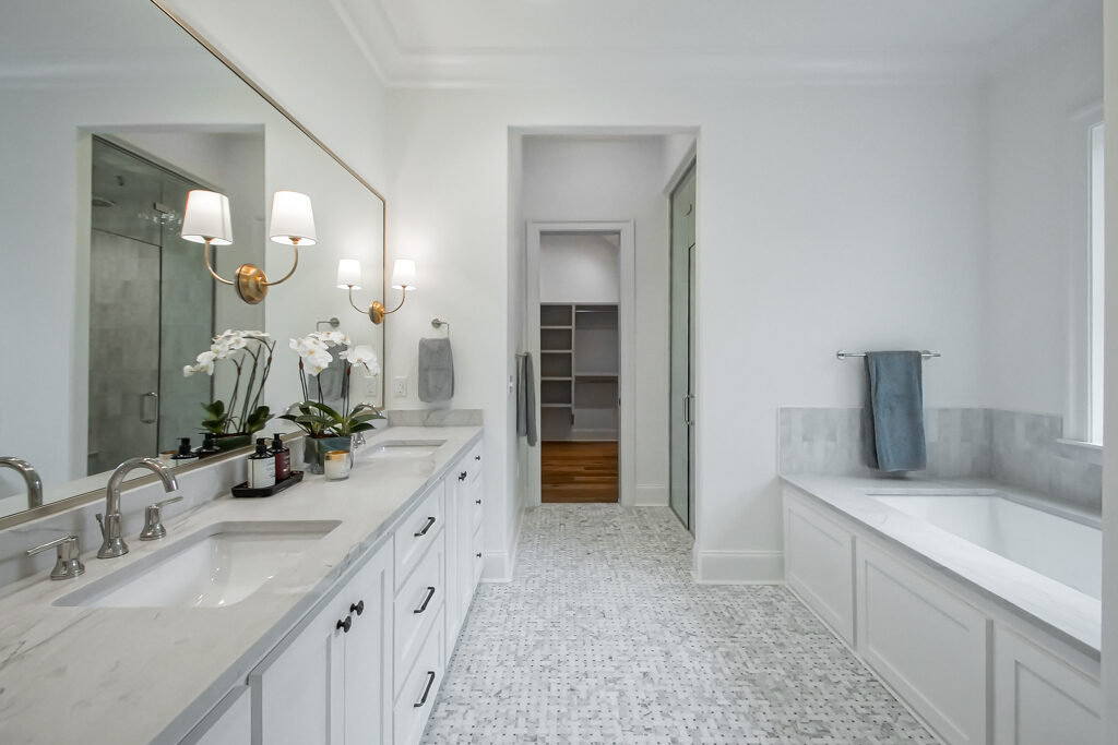 Spa-style primary bathroom with freestanding tub