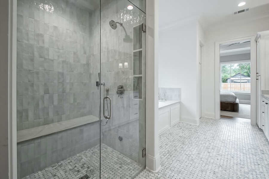Primary bath dual vanities with marble countertops