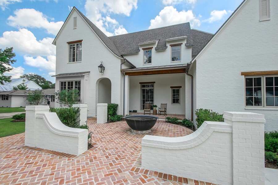 Exterior detail with fire bowl and landscaping