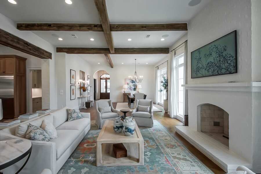 Custom built-in shelving flanking the fireplace