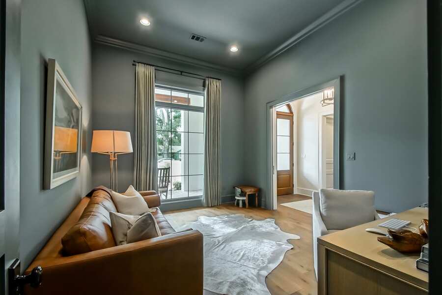 Home office with custom built-ins and natural light