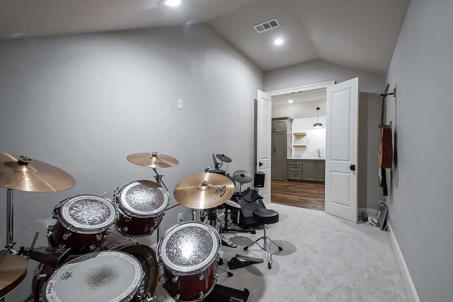 Dedicated music room opening off the bonus room