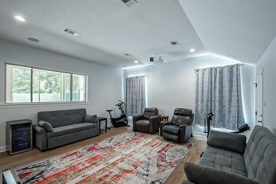 New vaulted living and media room in the addition