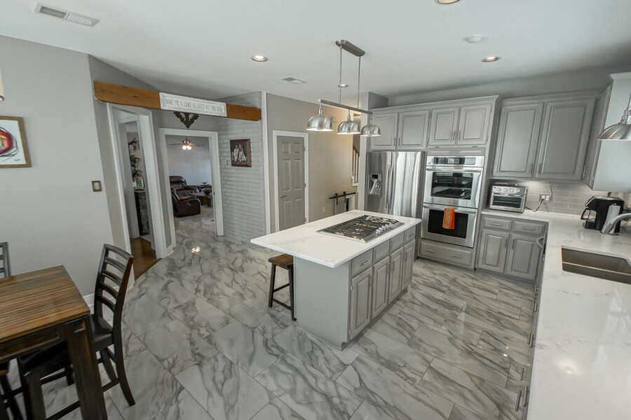 Kitchen island open to the breakfast area and living room
