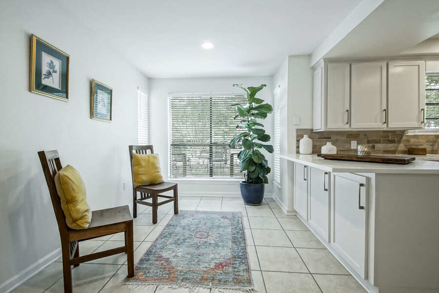 Breakfast seating area beside the renovated kitchen